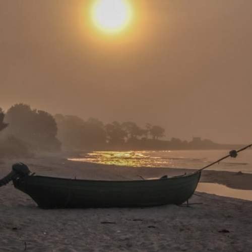Solnedgaang vid havet - Upplev AAhus kultur paa din semester i Skaane